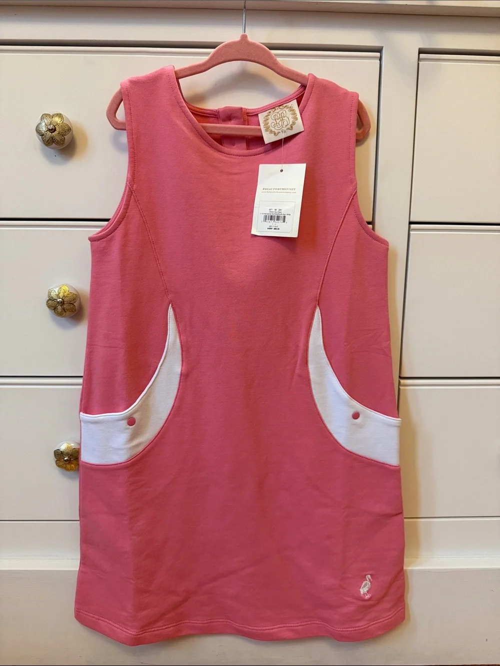 Pink Sleeveless Girls A-Line Top with White Pocket Accents